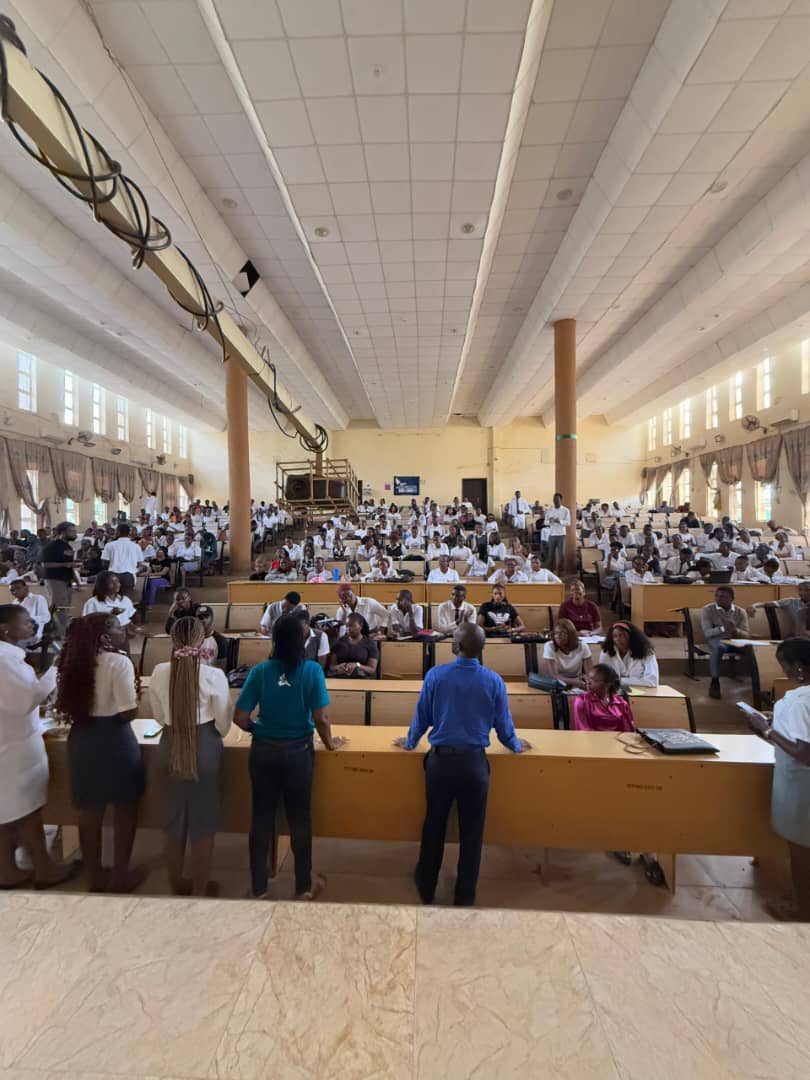 student club members in a hall
