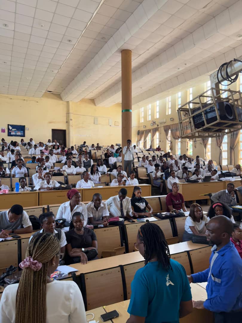 student club members in a hall